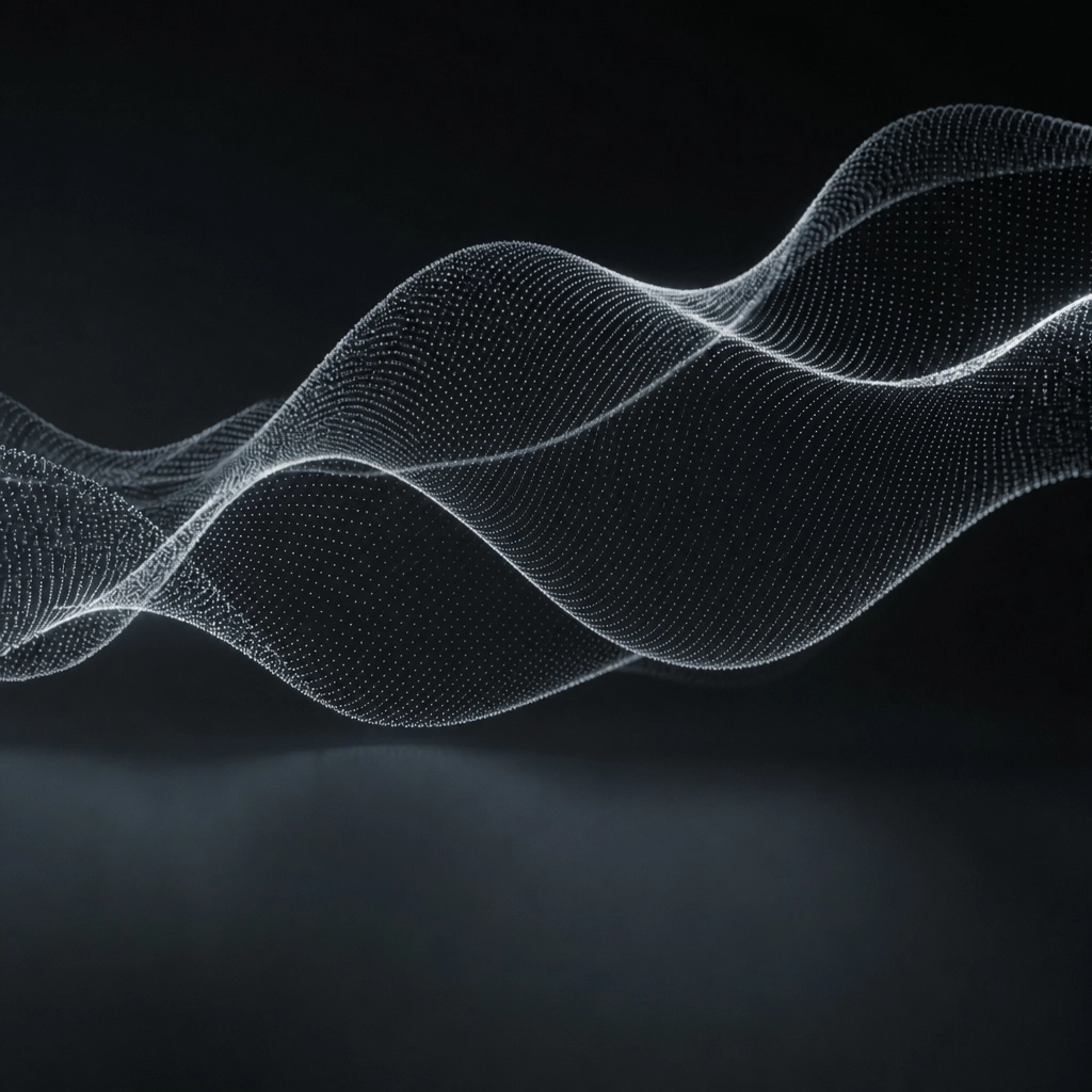 A dark wave form under low, warm light